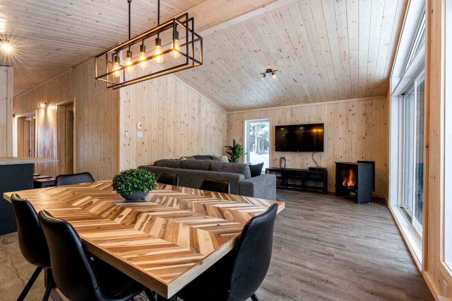 Secluded Forest Retreat with Stylish Interior in Domaine Charlevoix, Quebec