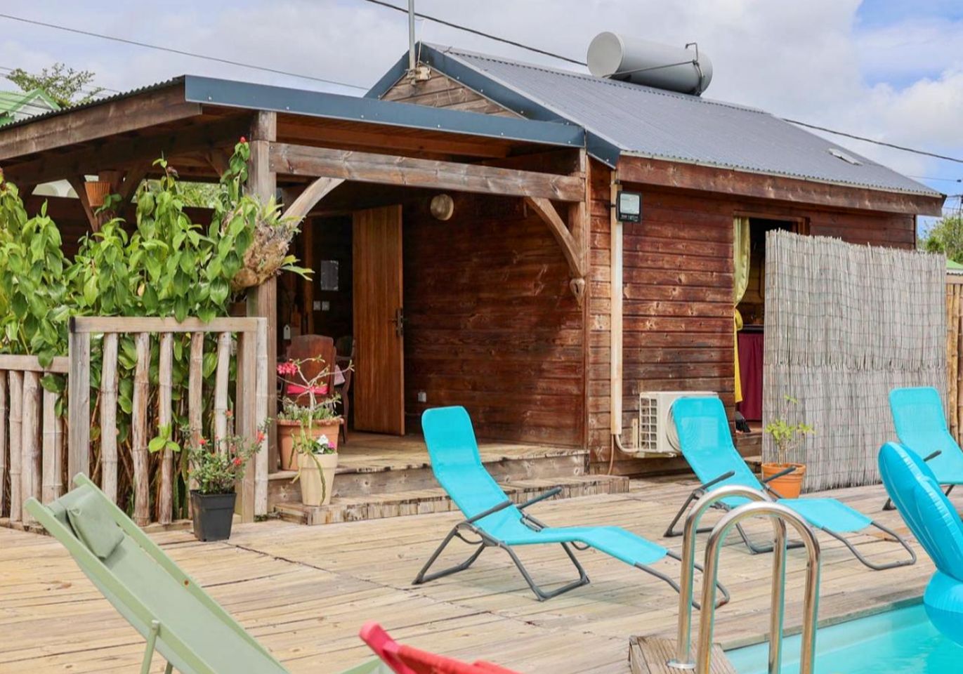 Enchanting Traditional Cottage with Hand-Carved Wood Art and Pool, Surrounded by Lush Nature Near Sainte-Rose, Guadeloupe