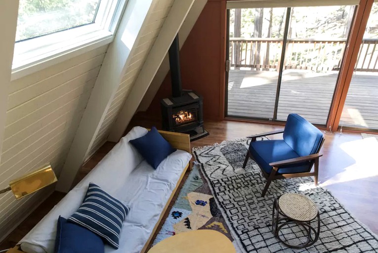 Aerial view of living area and deck of cabin for a Northern California getaway.