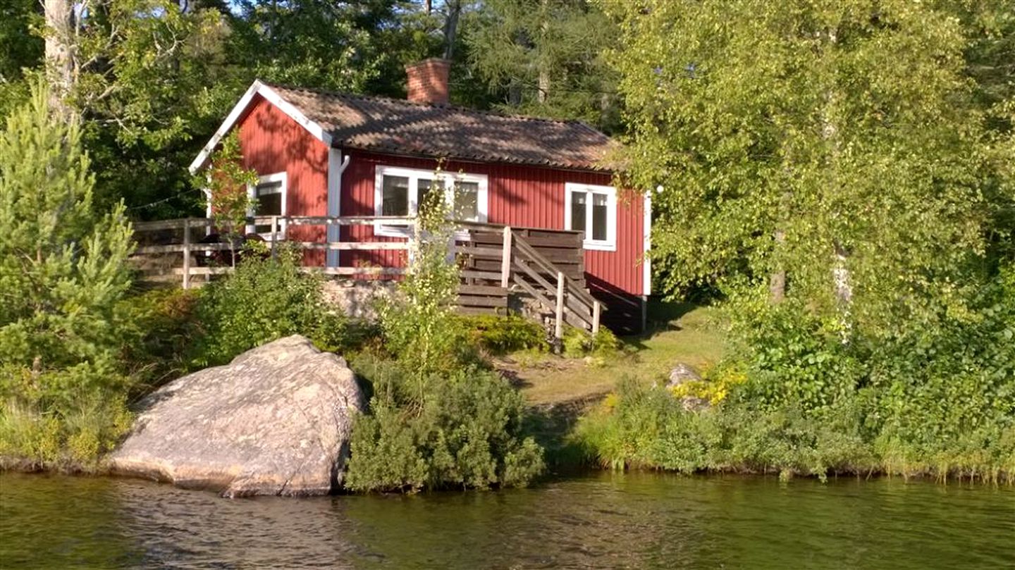 Inviting Lakefront Cabin Rental with Fireplace in South Sweden