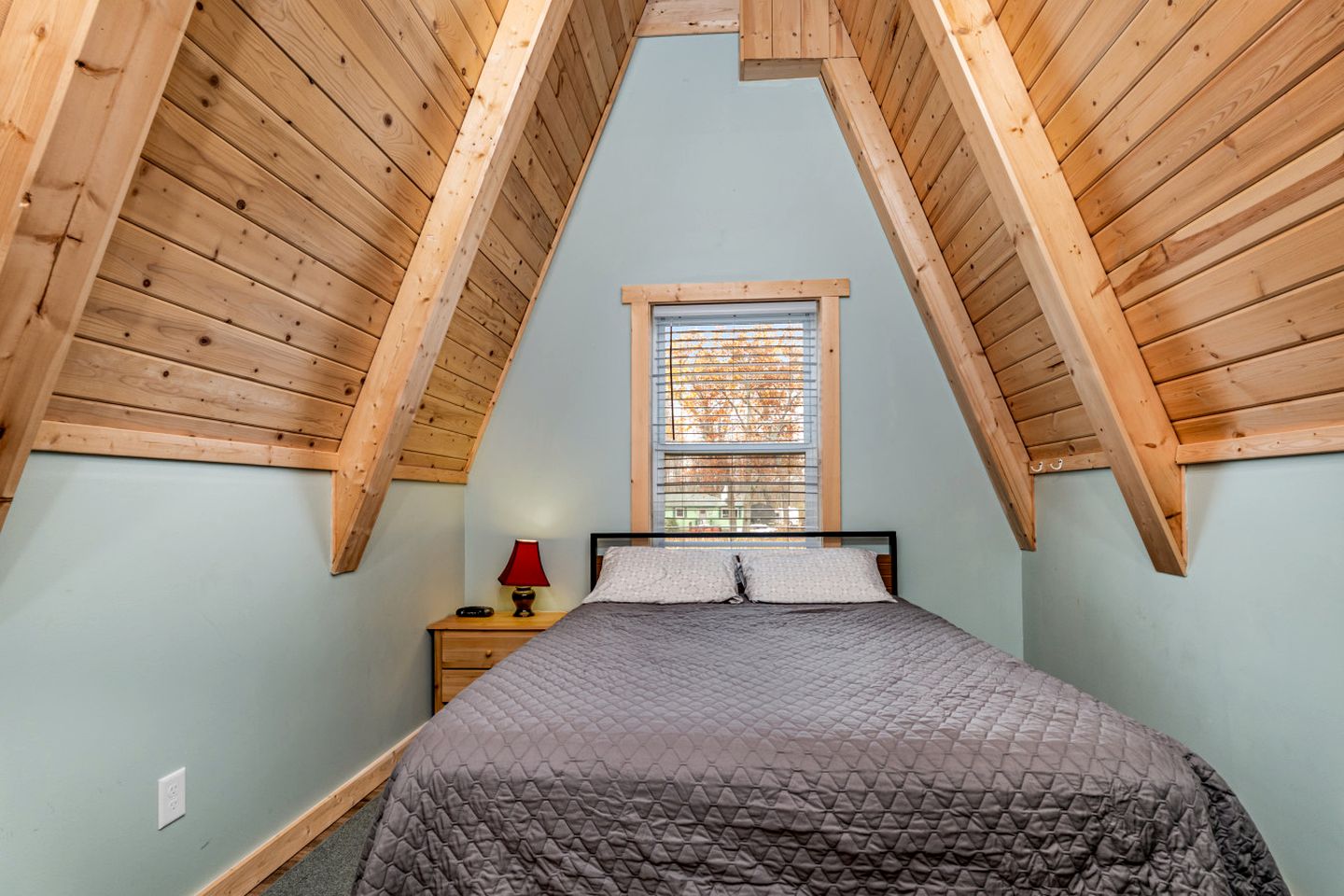 Lofted A-Frame Cabin with Direct Lake Access and Equipped Deck in Michigan