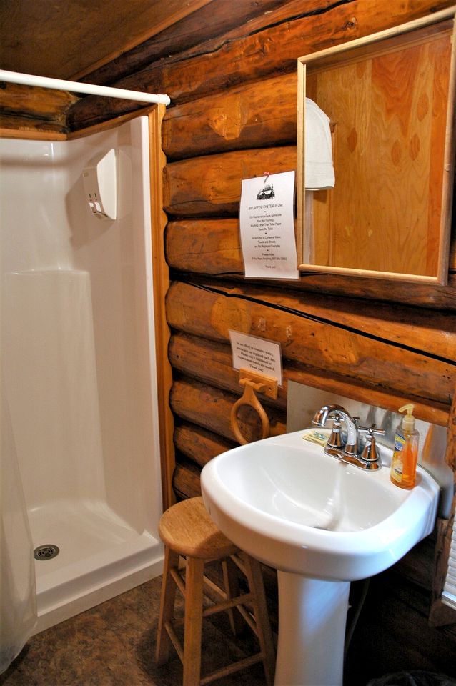 Traditional Log Cabin with Large Windows on the Kenai Peninsula, Alaska