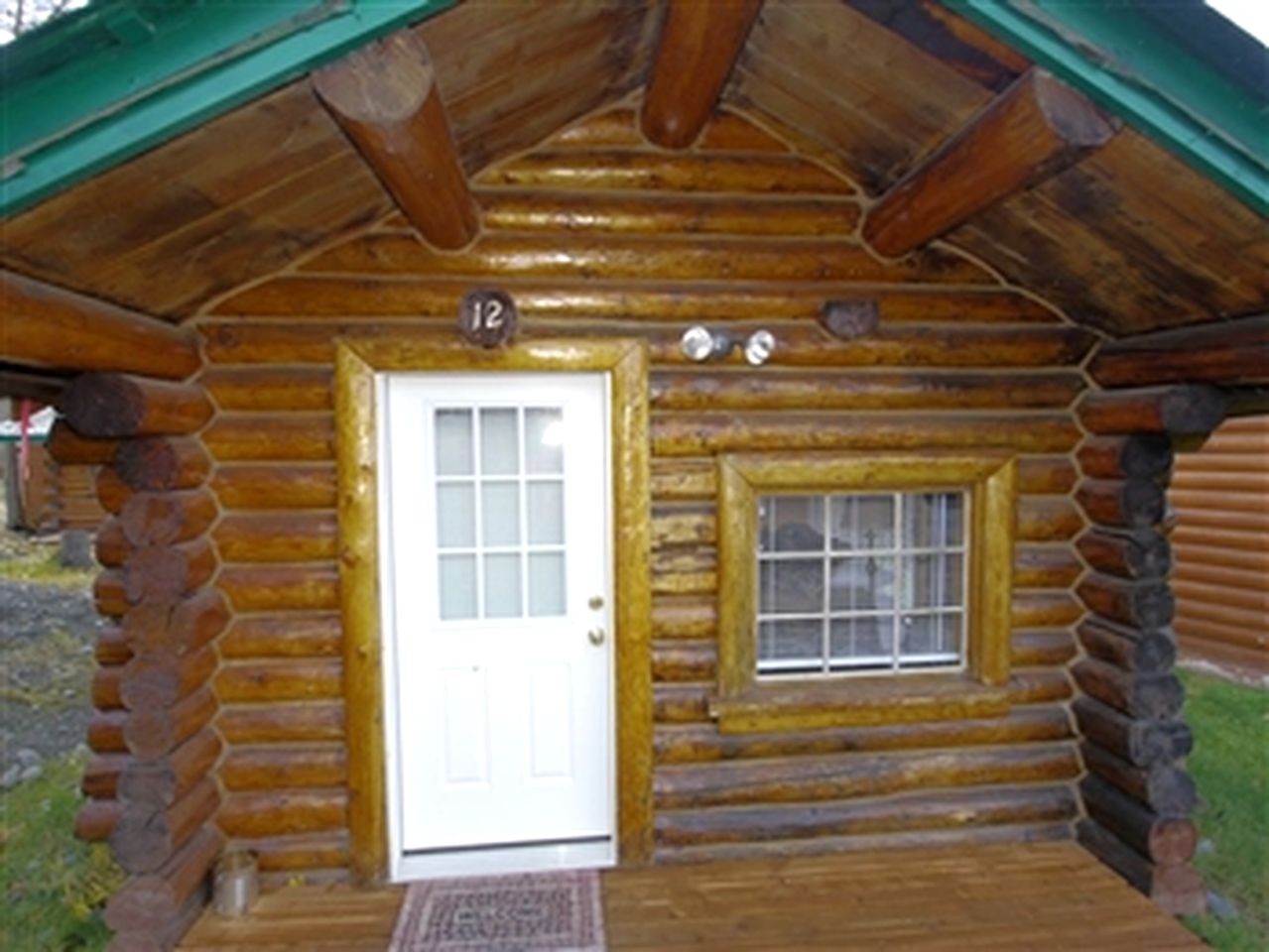 Traditional Log Cabin with Large Windows on the Kenai Peninsula, Alaska