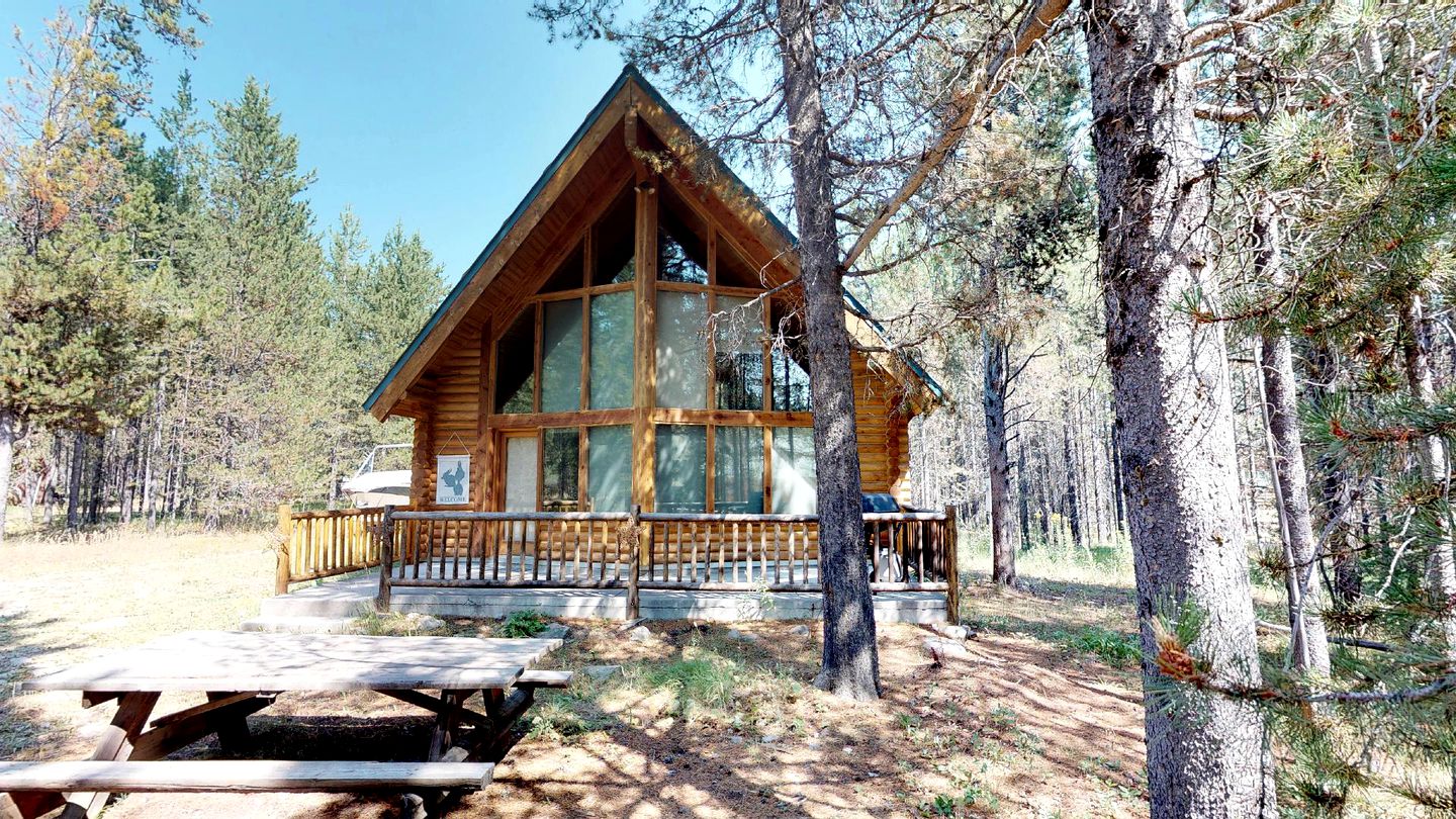 Inviting A-Frame Cabin Getaway Nestled in the Woods of Island Park, Idaho