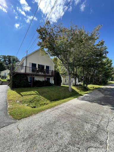 Cozy Lake Front Cabin with Private Beach Access and Stunning Views of Sebago Lake in Frye Island, Maine