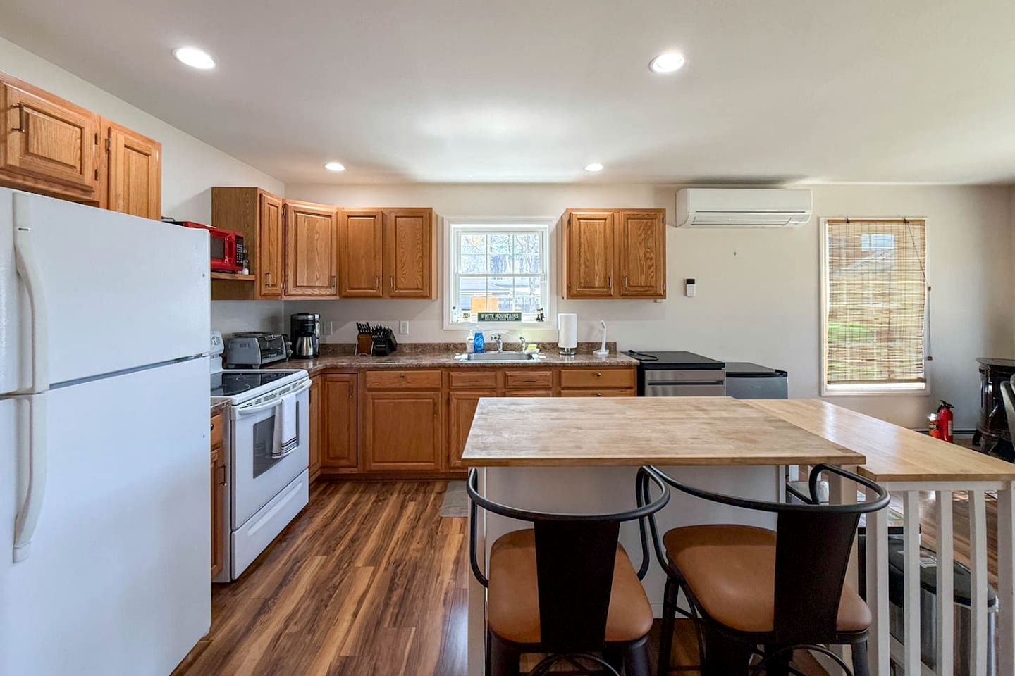 Serene Waterfront Four-Bedroom Retreat in Conway, New Hampshire with Pequawket Pond Views