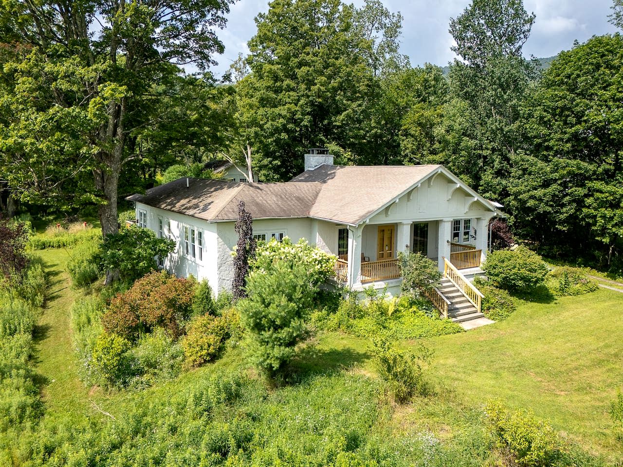 Charming Spanish Courtyard Retreat with Garden & Porch Views in Margaretville, New York