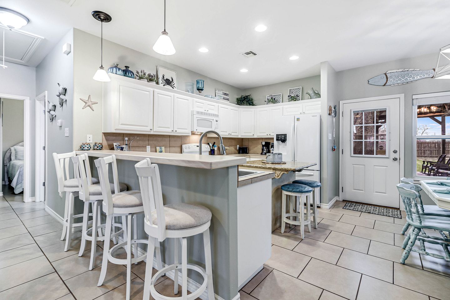 Cozy Coastal Escape with Covered Veranda and Game Room Minutes from Downtown Rockport TX