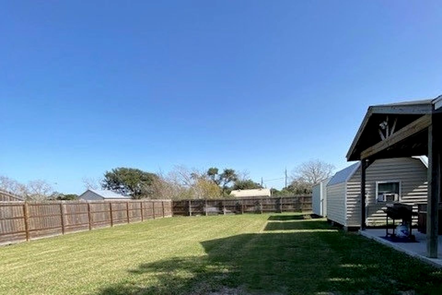 Cozy Coastal Escape with Covered Veranda and Game Room Minutes from Downtown Rockport TX