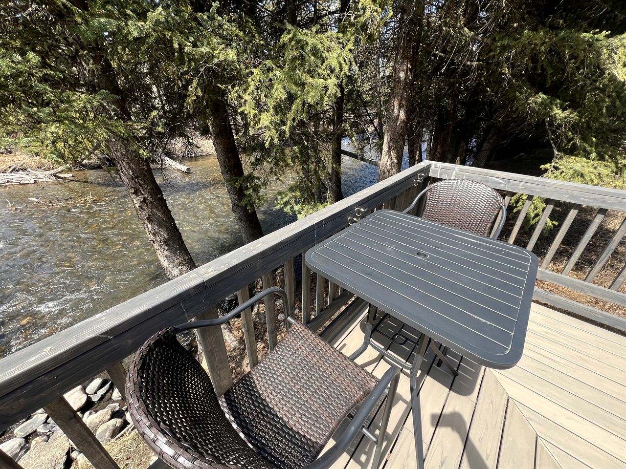 Charming Riverside Cabin with Deck Overlooking Madison River near Three Dollar Bridge in McAllister, Montana
