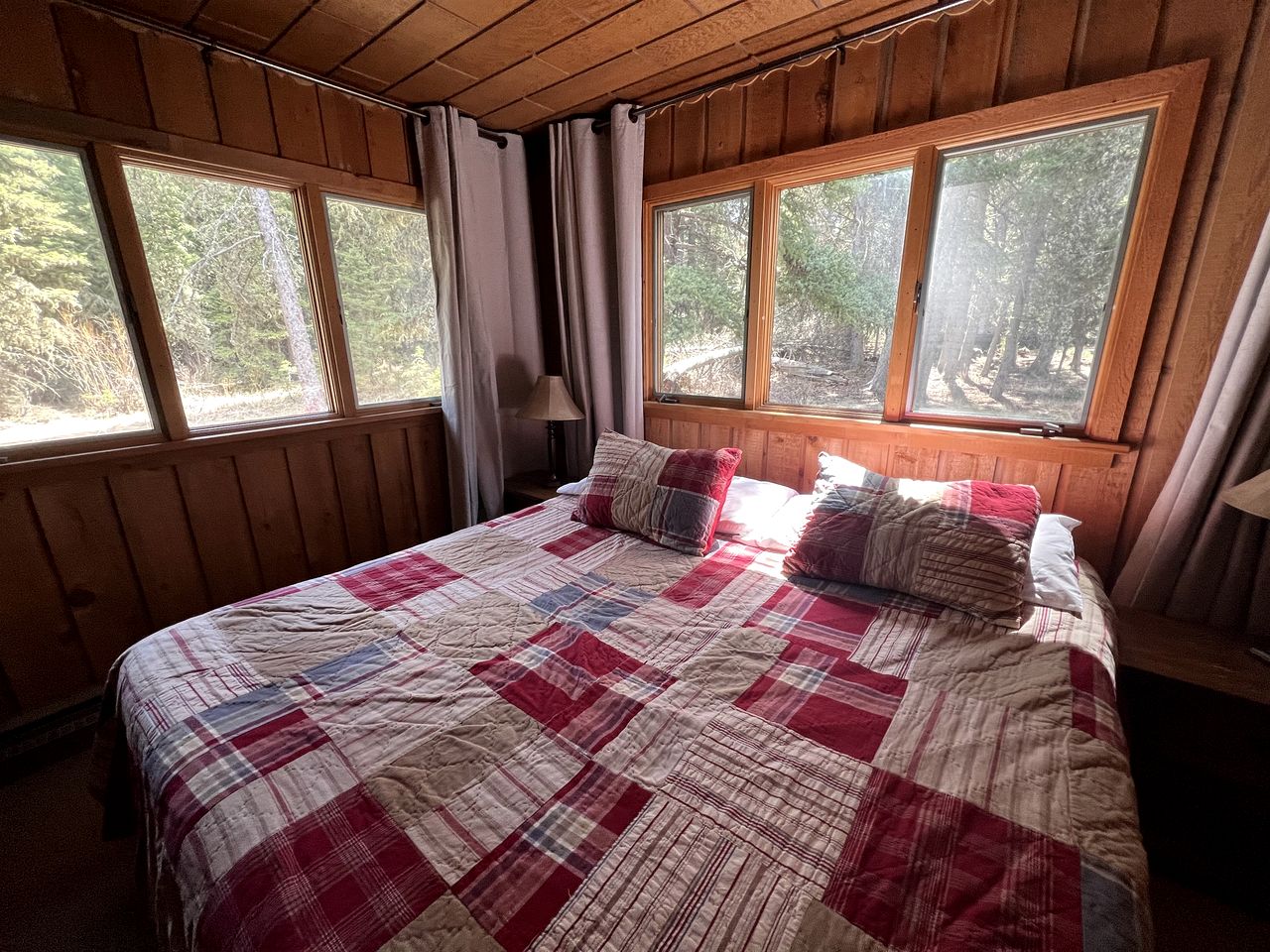 Charming Riverside Cabin with Deck Overlooking Madison River near Three Dollar Bridge in McAllister, Montana