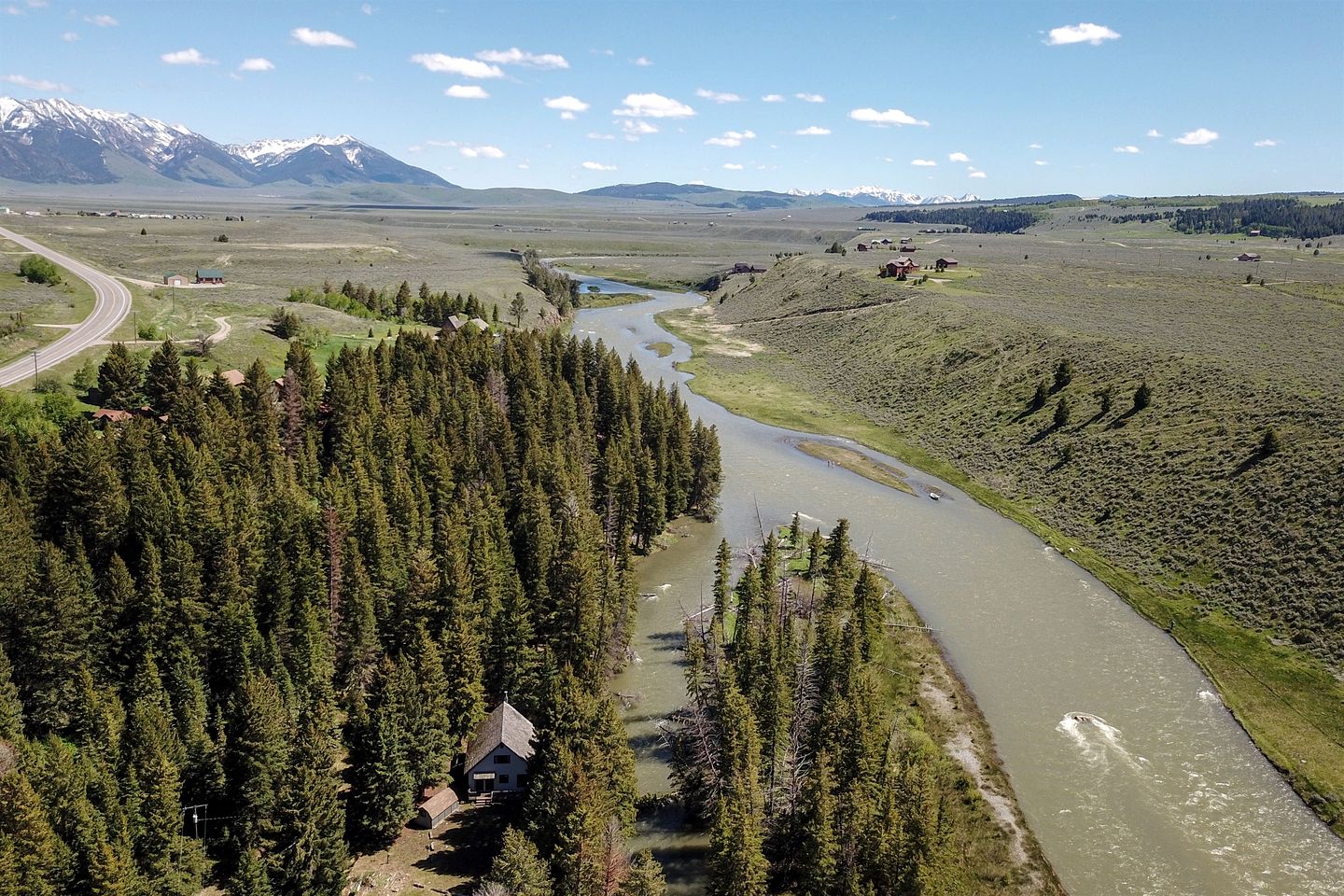 Charming Riverside Cabin with Deck Overlooking Madison River near Three Dollar Bridge in McAllister, Montana