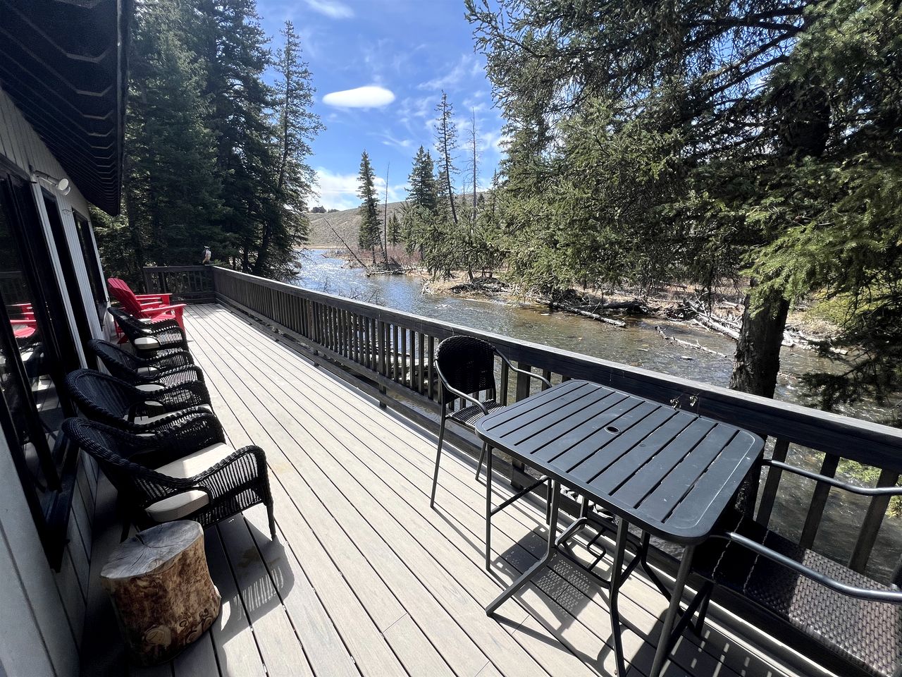 Charming Riverside Cabin with Deck Overlooking Madison River near Three Dollar Bridge in McAllister, Montana