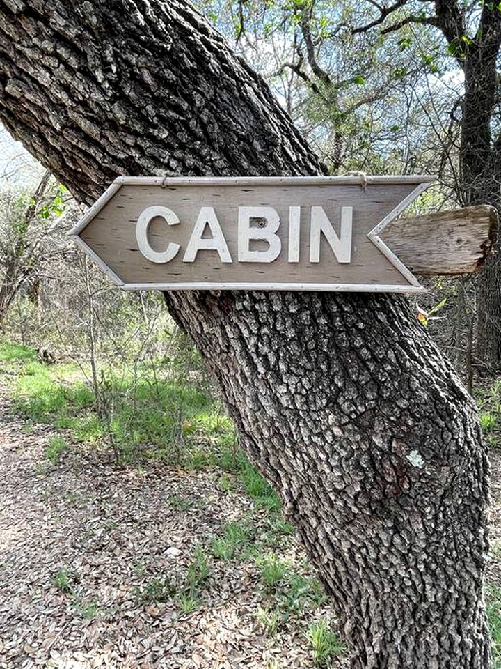Two-Story Cabin Rental for Large Groups along Hamilton Creek in Marble Falls, Texas