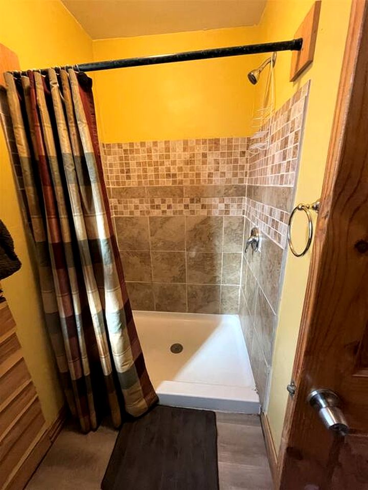 Two-Story Cabin Rental for Large Groups along Hamilton Creek in Marble Falls, Texas