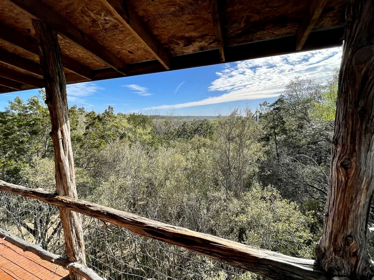 Two-Story Cabin Rental for Large Groups along Hamilton Creek in Marble Falls, Texas