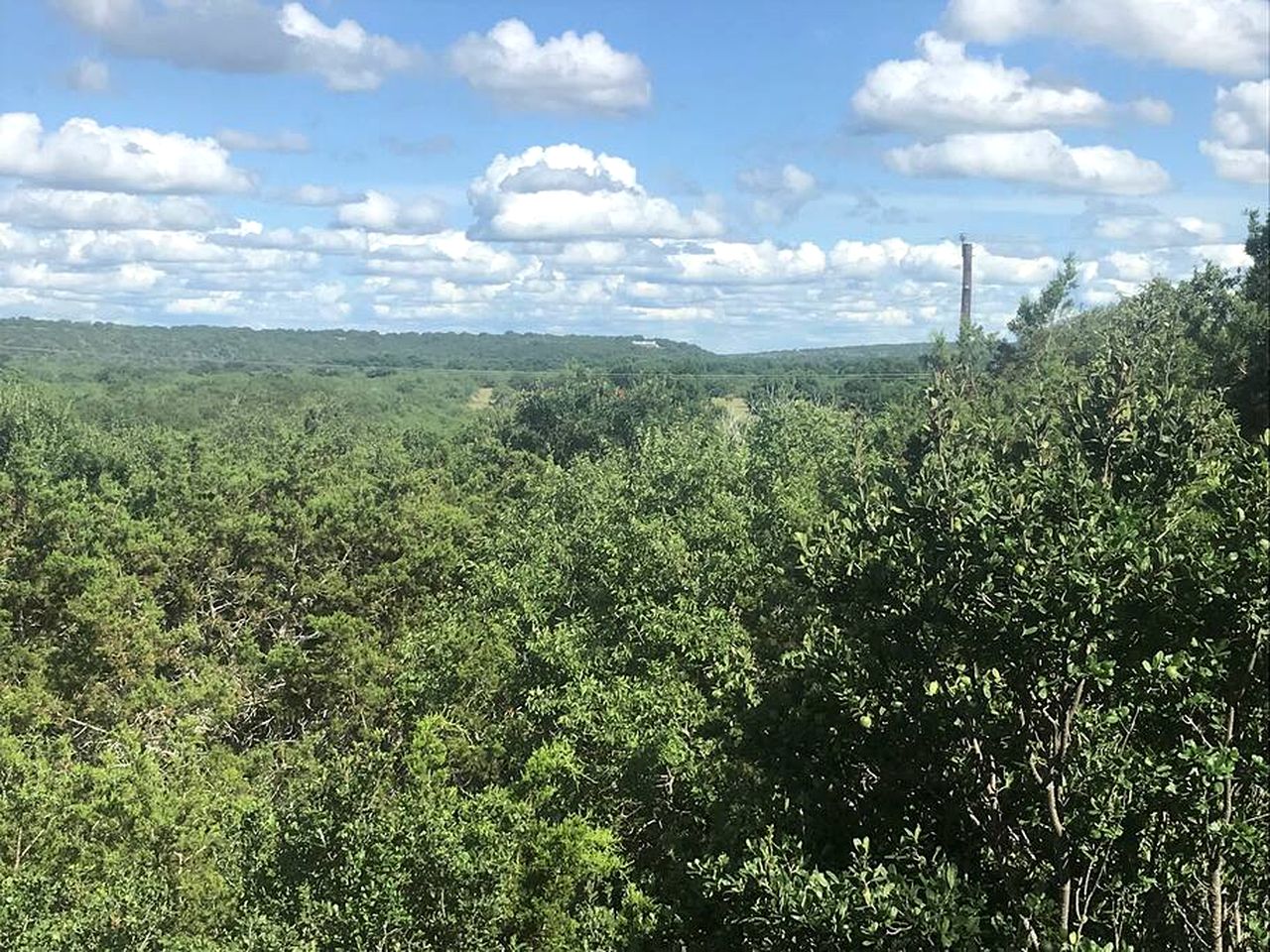 Two-Story Cabin Rental for Large Groups along Hamilton Creek in Marble Falls, Texas