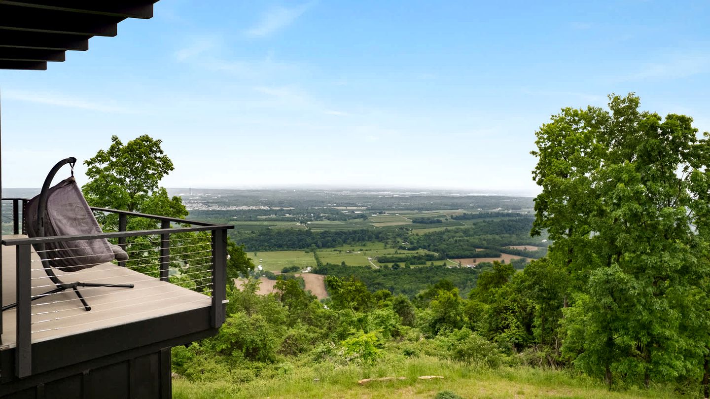 Scenic Getaway Cabin w/ Fire Pit, Deck & Panoramic Views in Martinsburg, WV