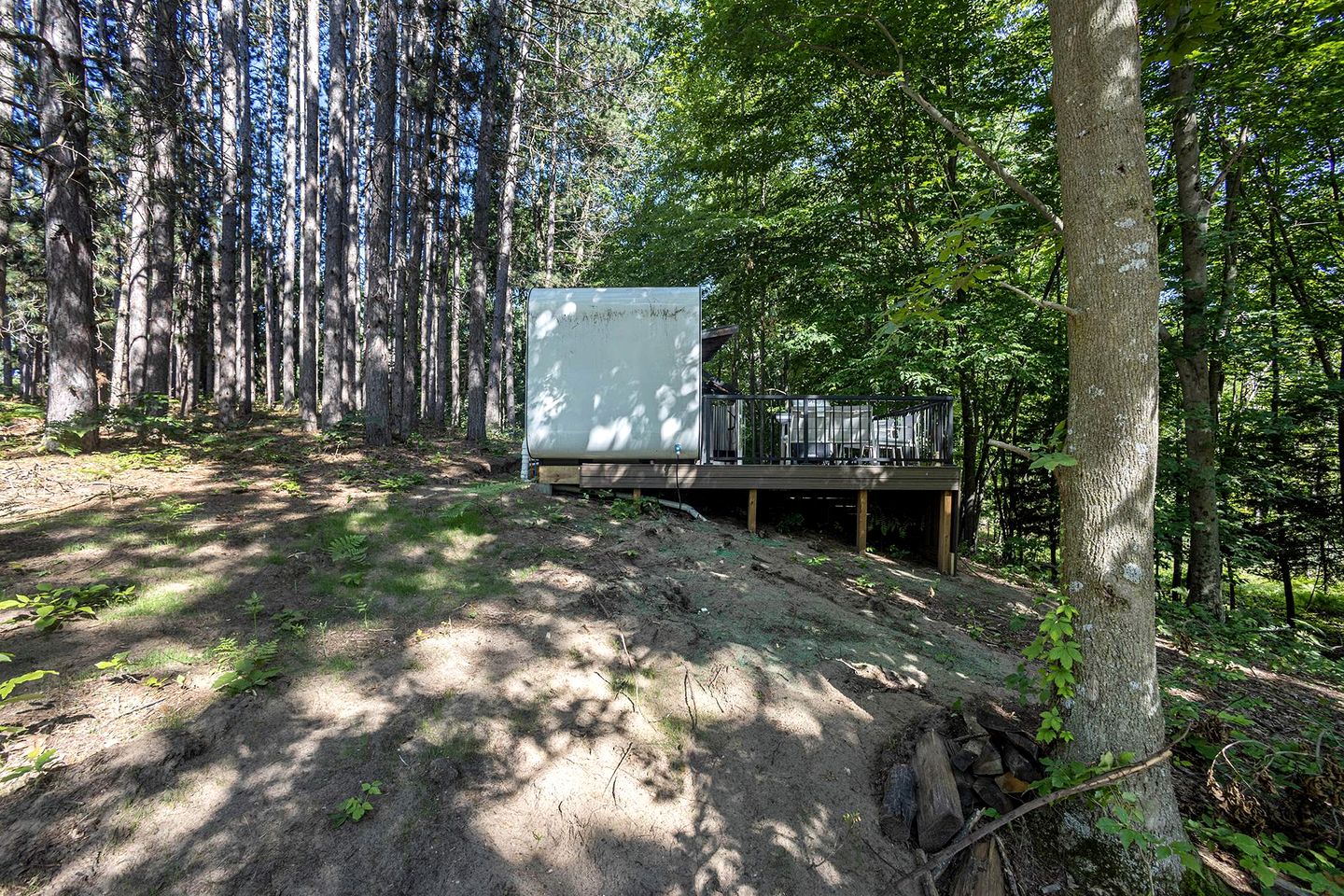 Secluded Modern Tiny House with Wood-Fired Hot Tub Near Trails in Sears, Michigan