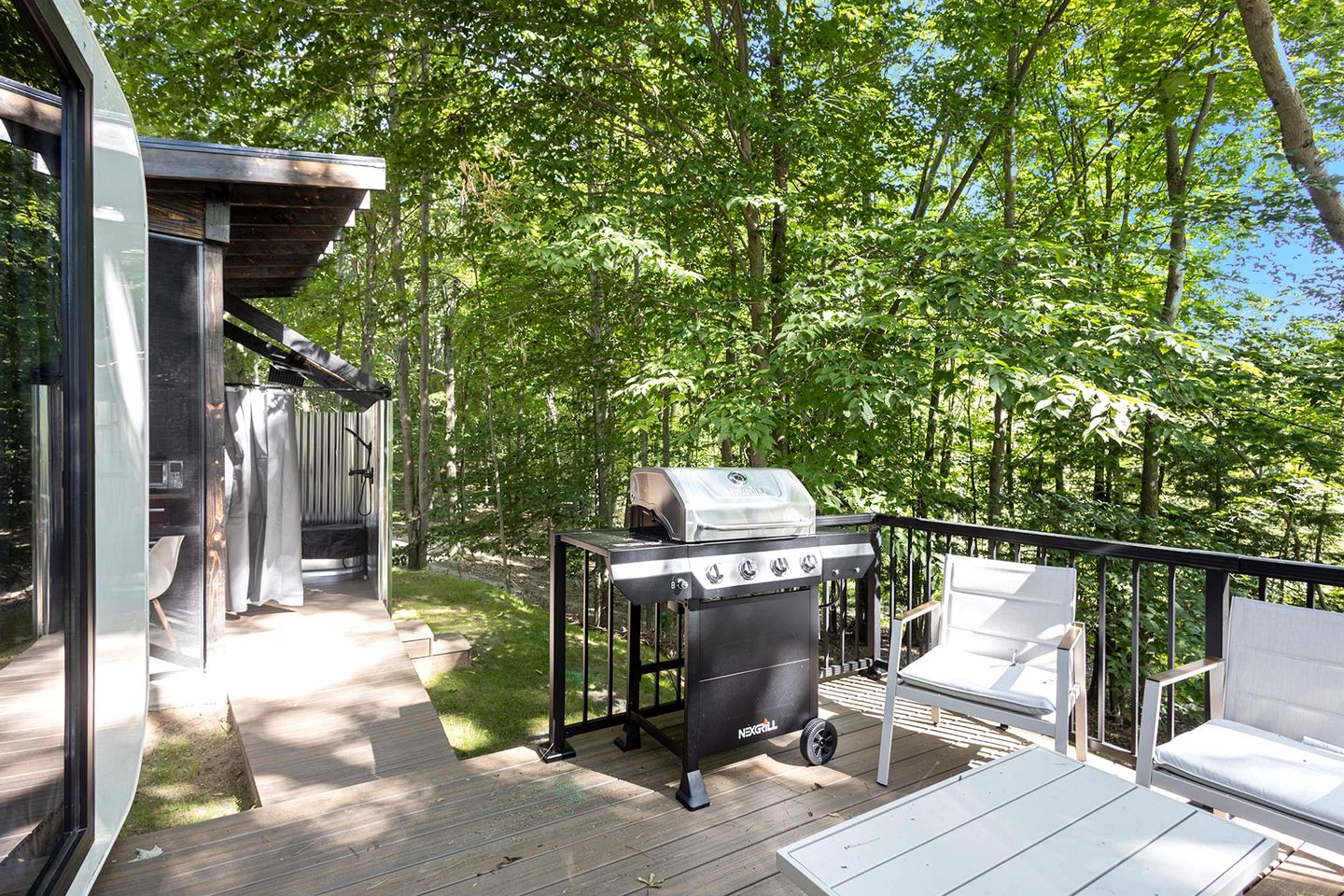 Secluded Modern Tiny House with Wood-Fired Hot Tub Near Trails in Sears, Michigan