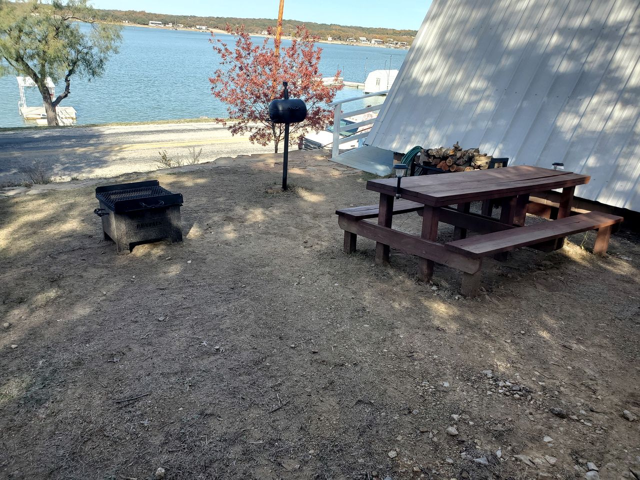 Charming Lakeside Cabin with Fire Pit & Private Dock Near Lake Cisco, Cisco, TX