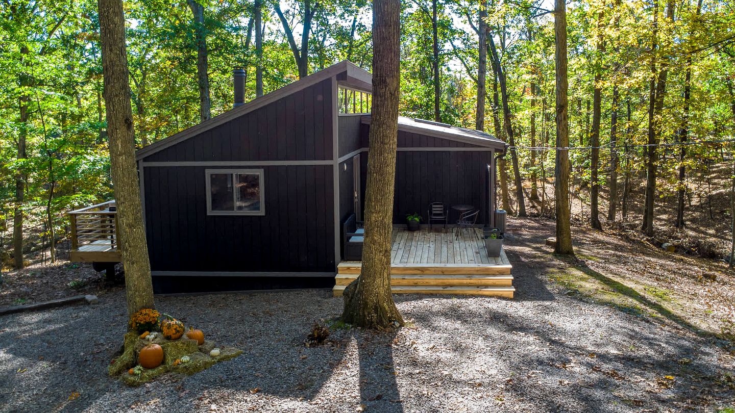 Modern Forest Cabin with Hot Tub, Screened Porch & Resort Access Near Hedgesville, WV