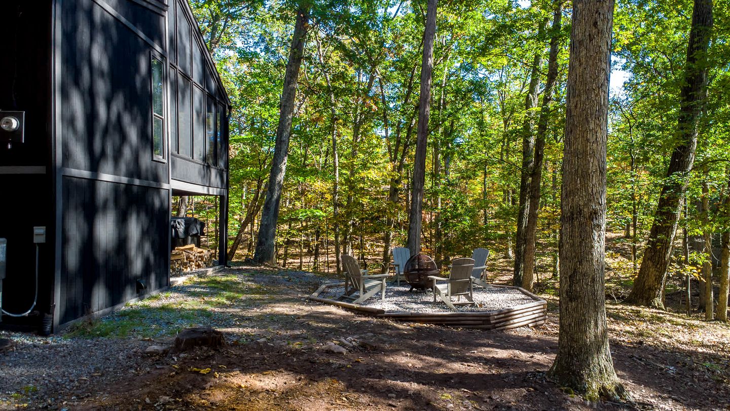 Modern Forest Cabin with Hot Tub, Screened Porch & Resort Access Near Hedgesville, WV