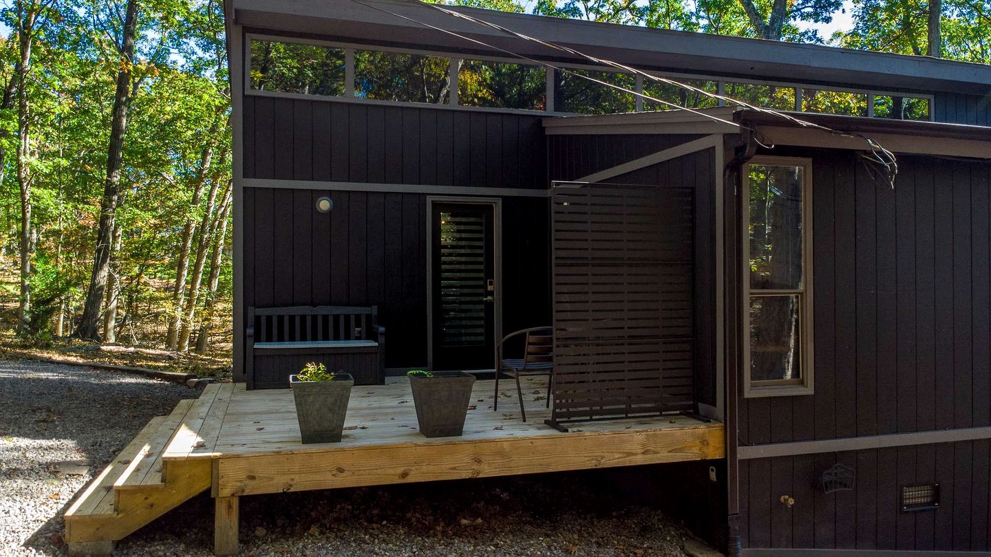 Modern Forest Cabin with Hot Tub, Screened Porch & Resort Access Near Hedgesville, WV