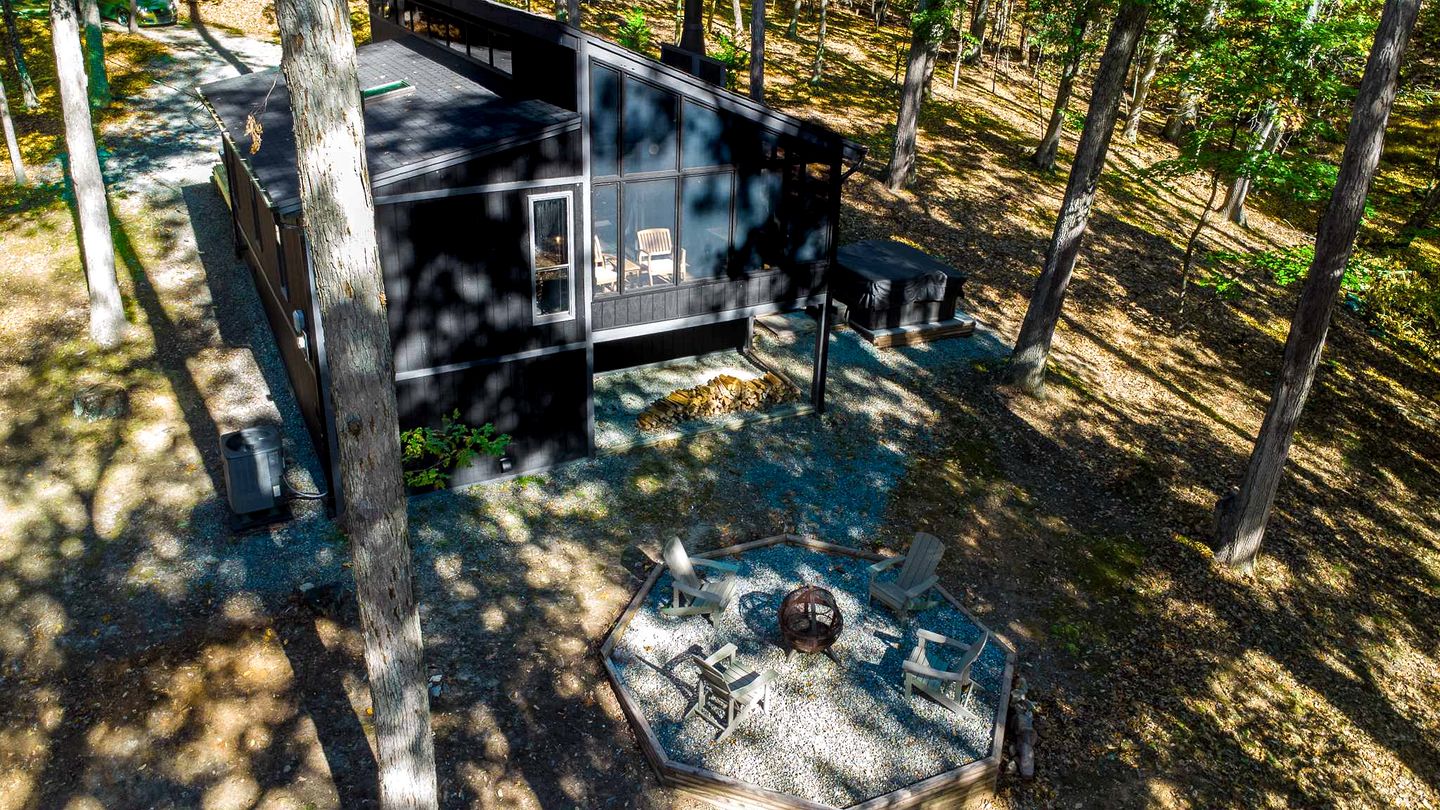 Modern Forest Cabin with Hot Tub, Screened Porch & Resort Access Near Hedgesville, WV