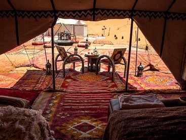 Moroccan Style Tents Surrounded by Sand Dunes in Beautiful African Desert photo 2