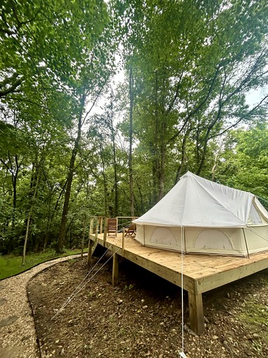 Enchanting Mountain Glamping Tents with Elevated Decks and Fire Pit Near Gentry, AR