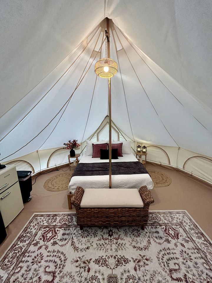 Enchanting Mountain Glamping Tents with Elevated Decks and Fire Pit Near Gentry, AR