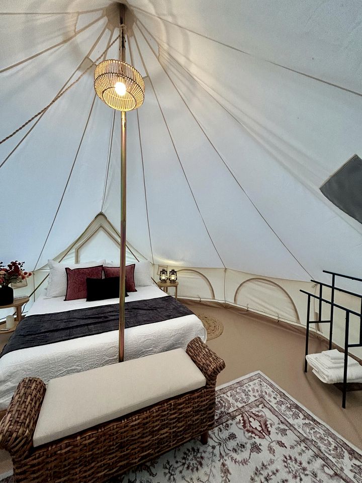 Enchanting Mountain Glamping Tents with Elevated Decks and Fire Pit Near Gentry, AR