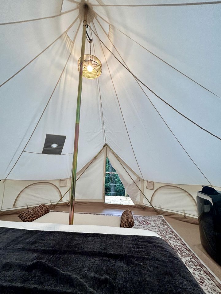 Enchanting Mountain Glamping Tents with Elevated Decks and Fire Pit Near Gentry, AR