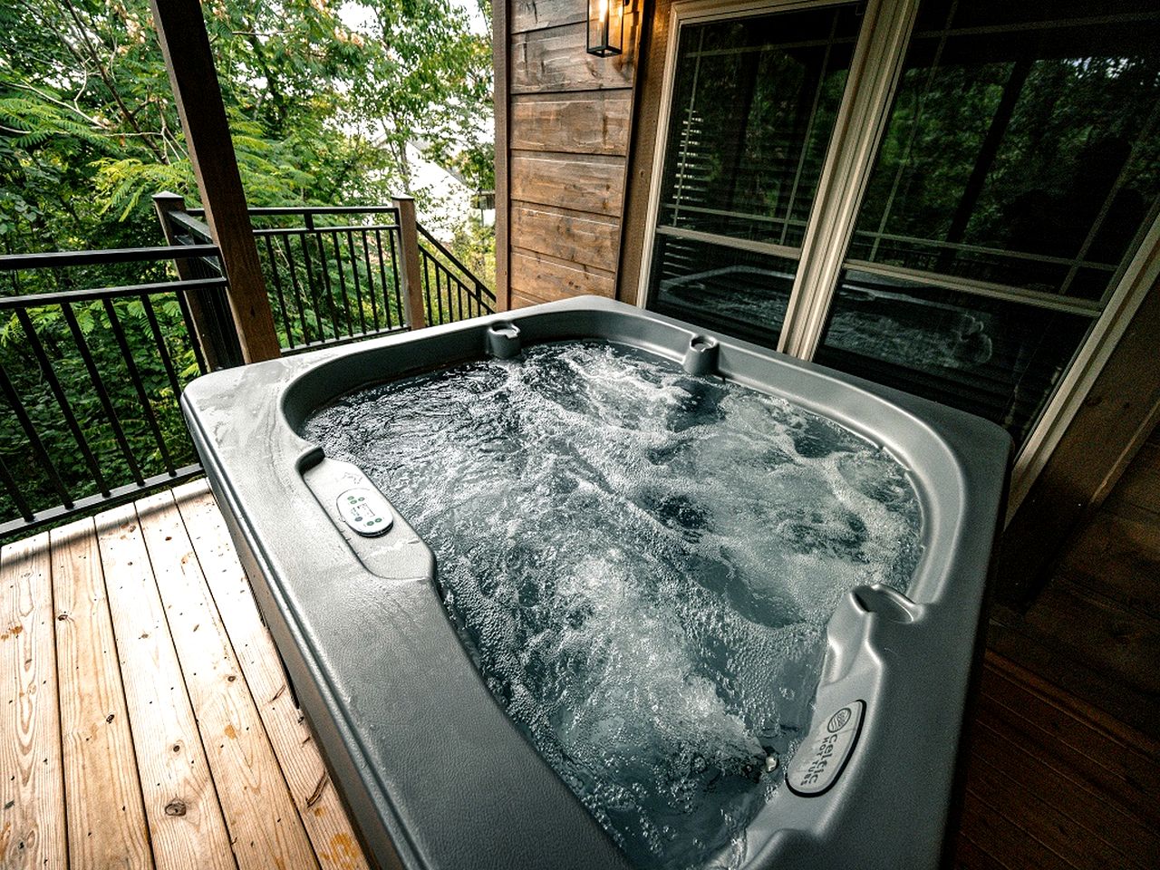 Modern Luxury Cabin with Hot Tub near Winfield Dunn Pkwy in Sevierville, TN