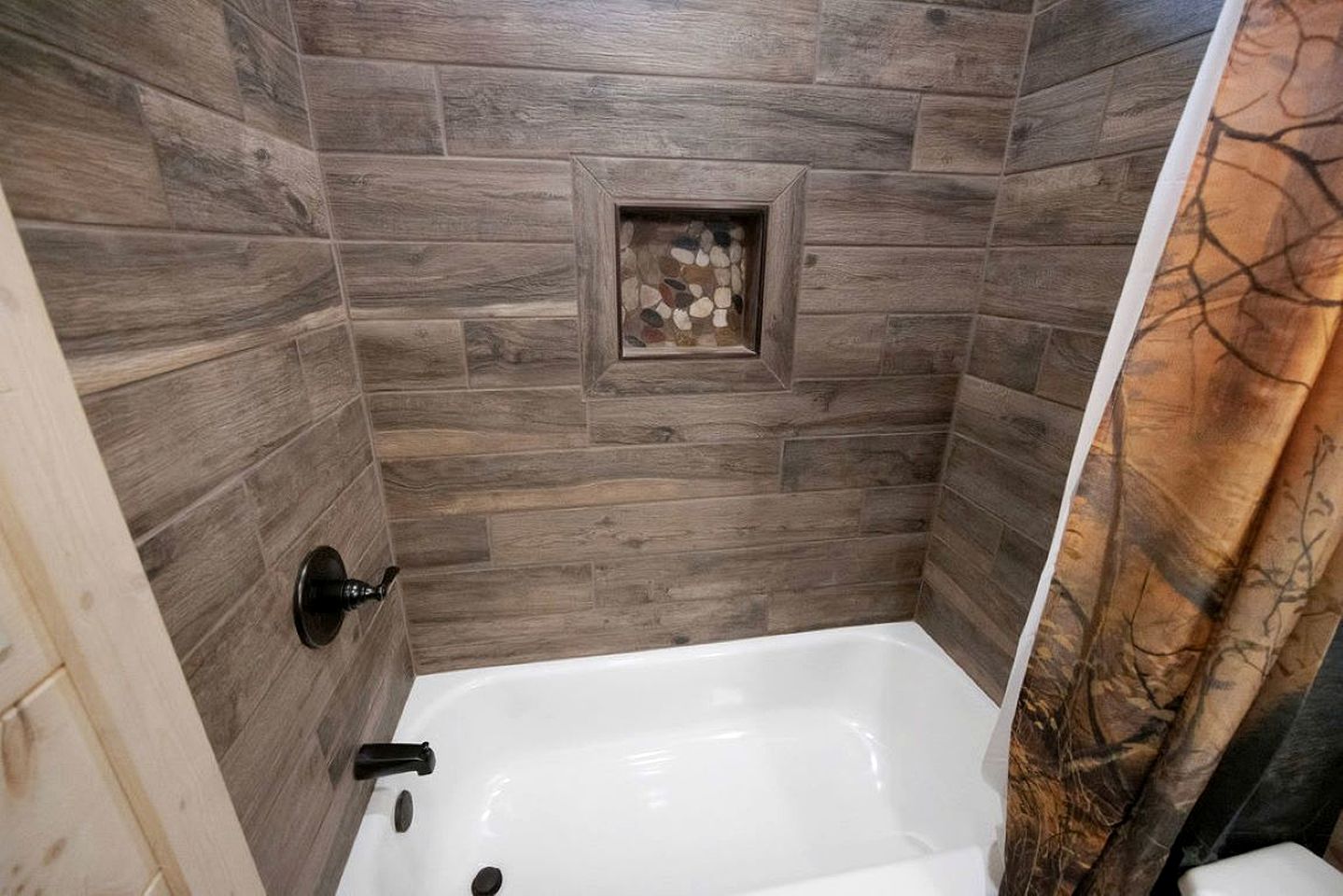 Modern Luxury Cabin with Hot Tub near Winfield Dunn Pkwy in Sevierville, TN