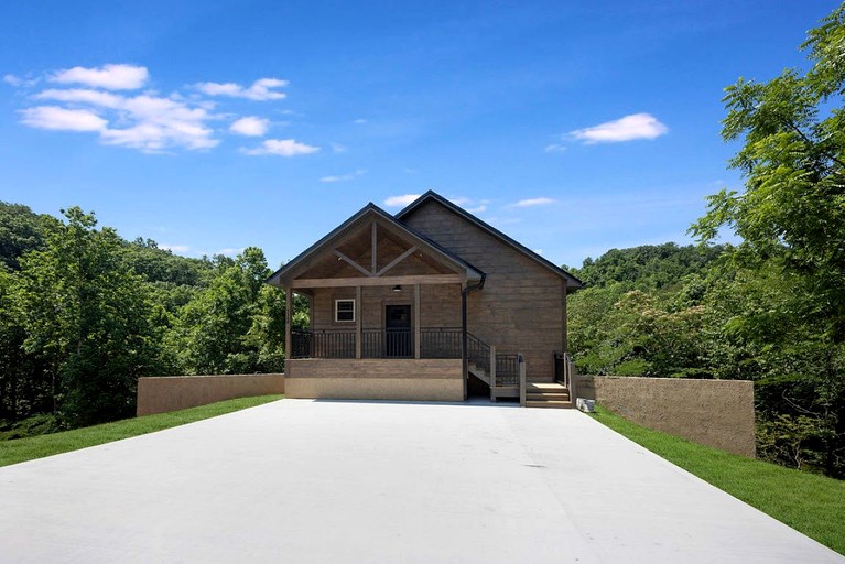 Modern Luxury Cabin with Hot Tub near Winfield Dunn Pkwy in Sevierville, TN