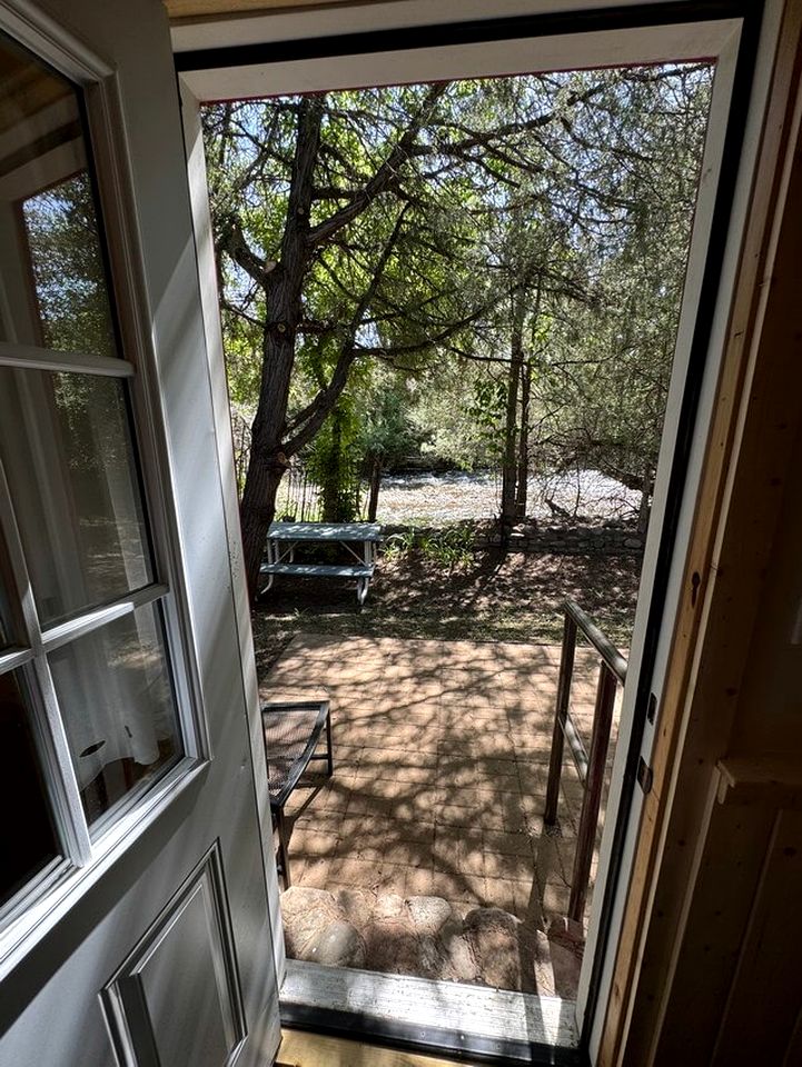 Cozy Rustic Cabin with Riverside Patio on the Pecos River – Pecos, New Mexico