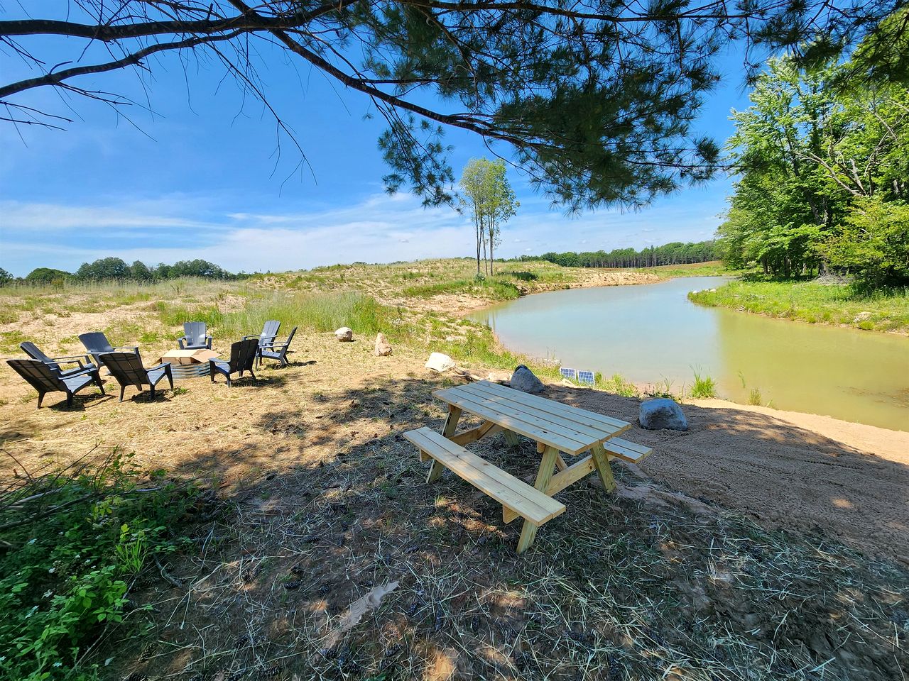 Secluded Rustic Cabins with Private Pond & Trails near ORV Routes in White Cloud, Michigan