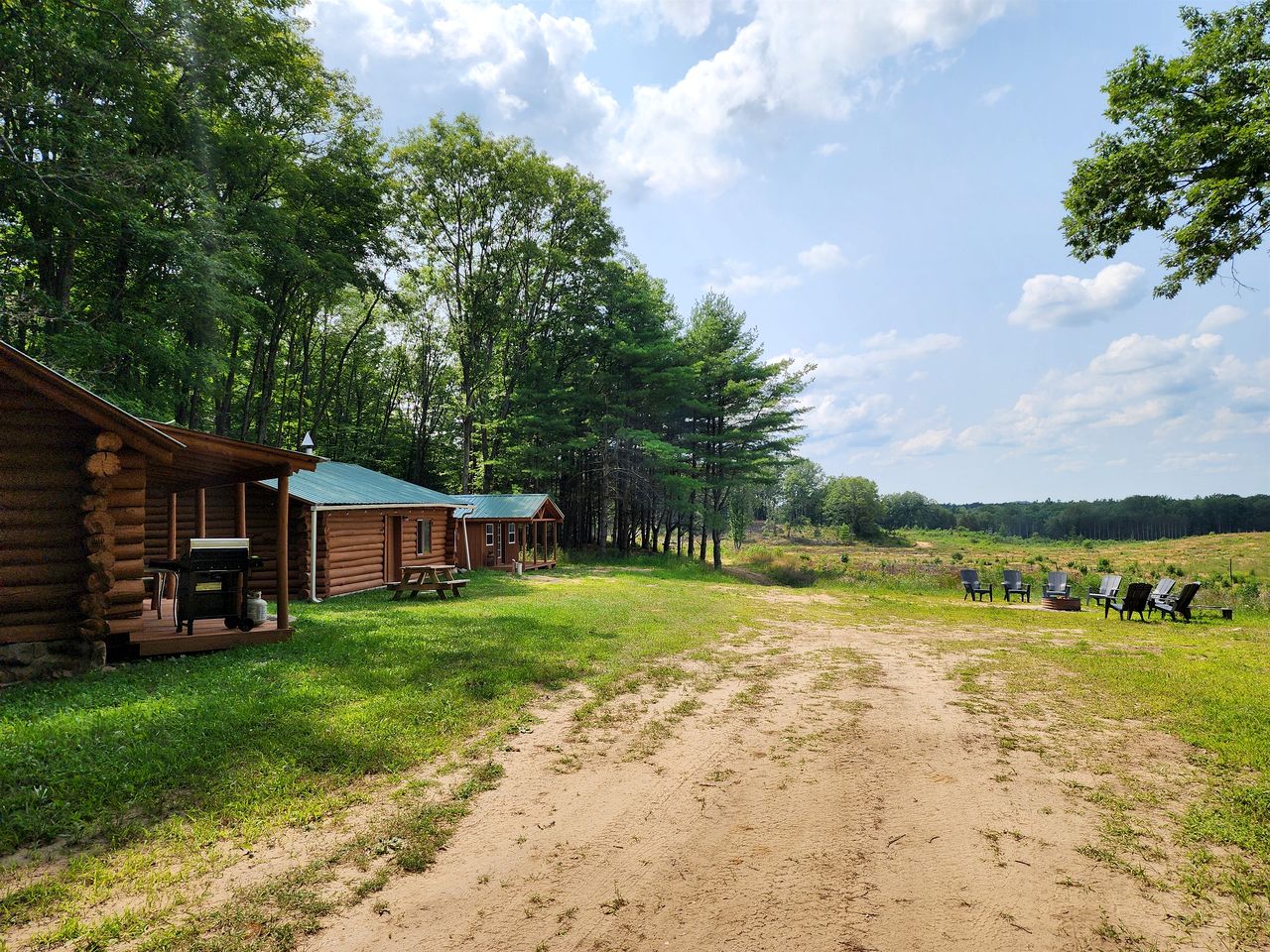 Secluded Rustic Cabins with Private Pond & Trails near ORV Routes in White Cloud, Michigan