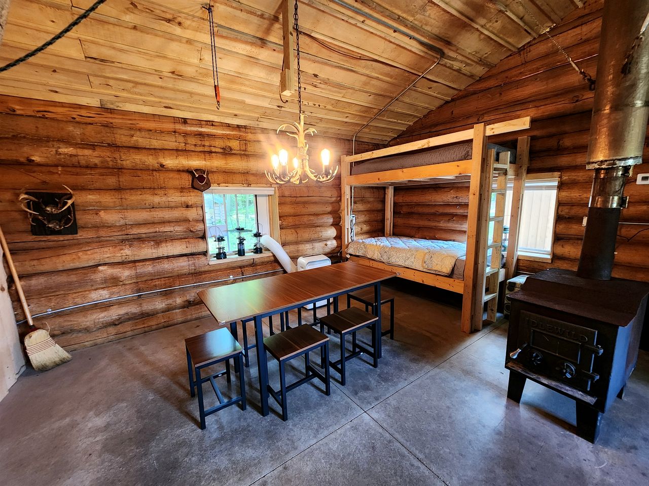 Secluded Rustic Cabins with Private Pond & Trails near ORV Routes in White Cloud, Michigan