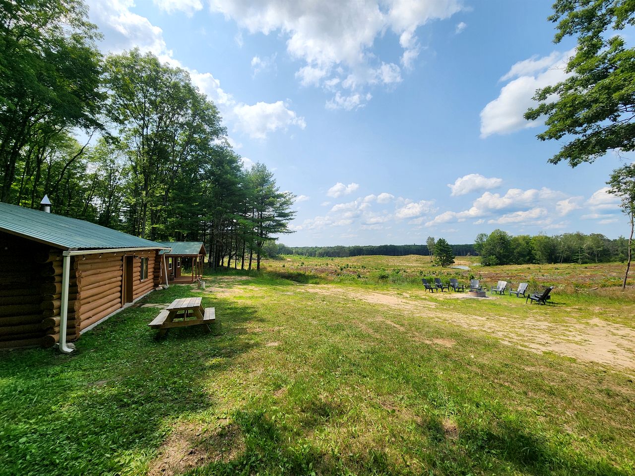 Secluded Rustic Cabins with Private Pond & Trails near ORV Routes in White Cloud, Michigan