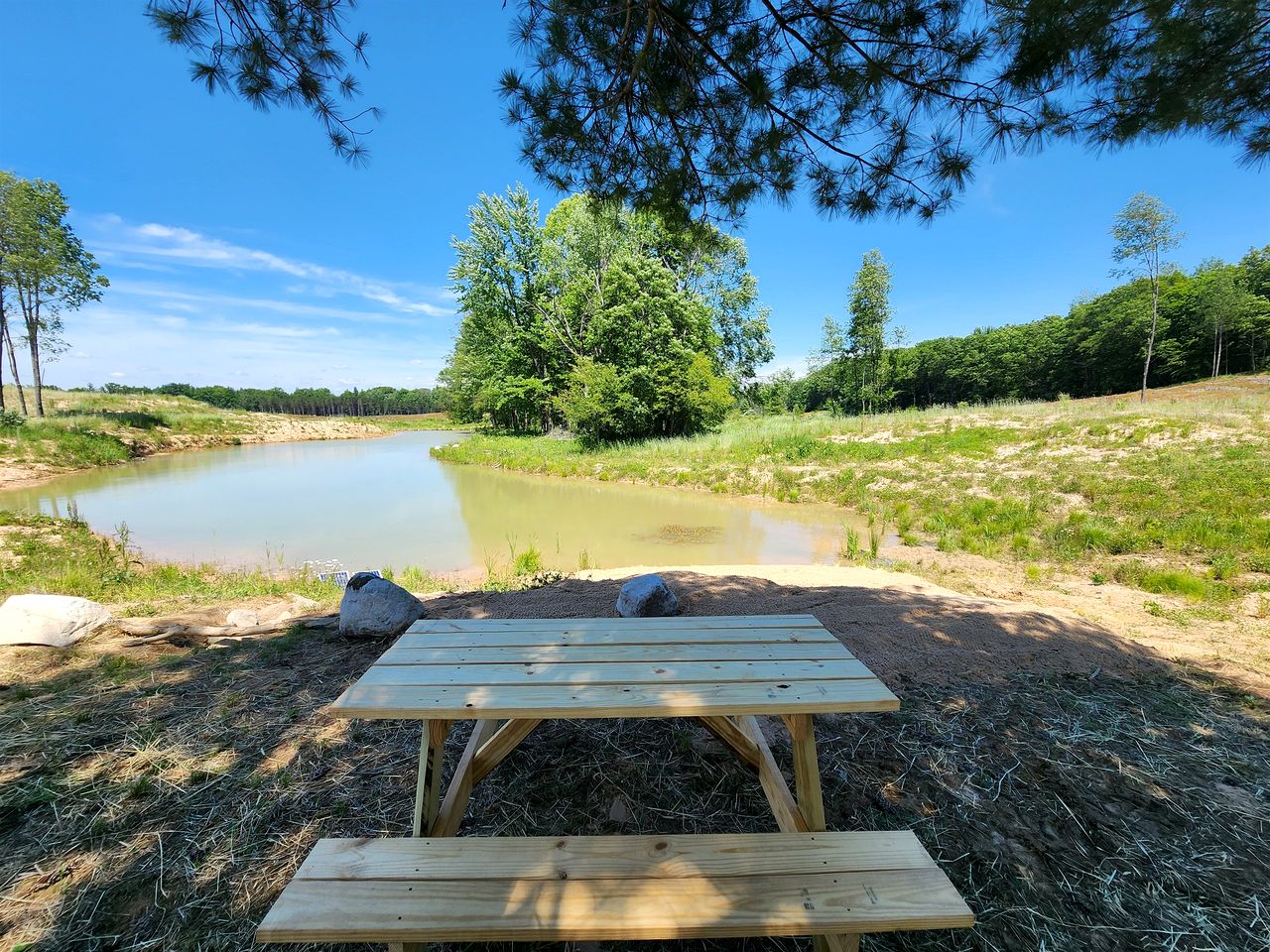Secluded Rustic Cabins with Private Pond & Trails near ORV Routes in White Cloud, Michigan