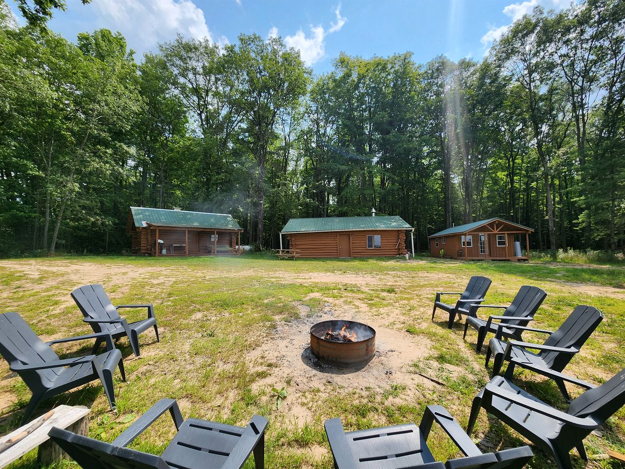 Secluded Rustic Cabins with Private Pond & Trails near ORV Routes in White Cloud, Michigan