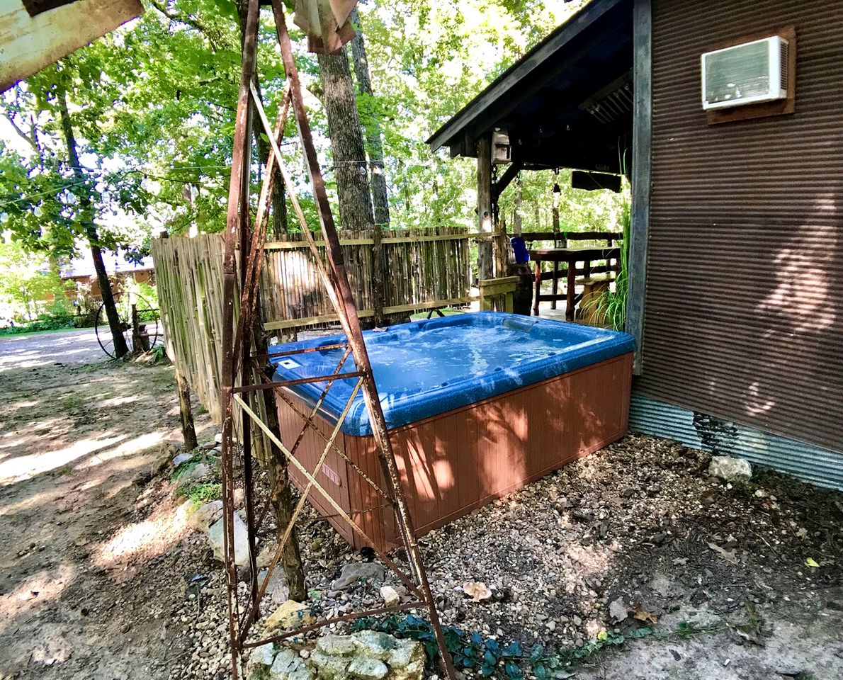 Arkansas Adventure Awaits: Cabin with Hot Tub and Riverfront Charm