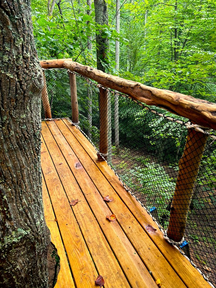 Magical Treehouse Stay with Creekside Sauna Experience in Zirconia, North Carolina