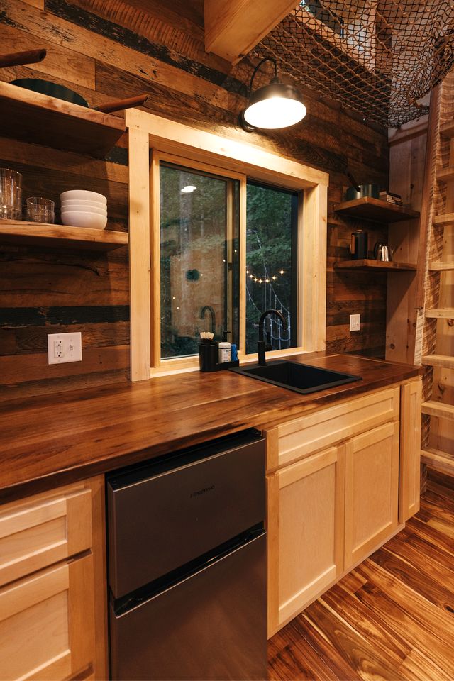 Magical Treehouse Stay with Creekside Sauna Experience in Zirconia, North Carolina