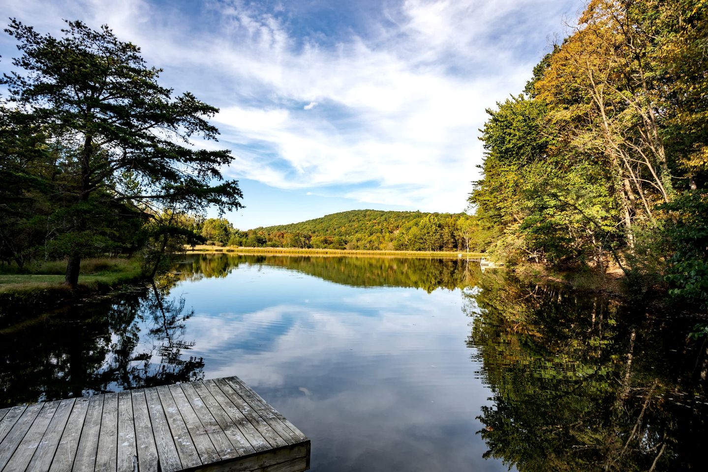 Peaceful Chalet-Cabin with a Private Lake, Hot Tub, Fire Pit and Deck at this Berkeley Springs, WV Getaway
