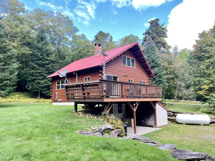 Fantastic Lakefront Wooden Cabin Settled Between Trees in Stratton, Vermont