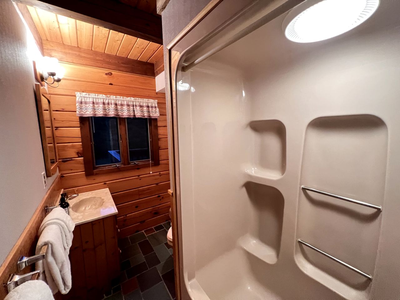 Fantastic Lakefront Wooden Cabin Settled Between Trees in Stratton, Vermont
